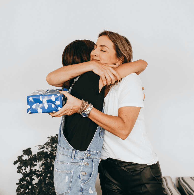 Suggest a Secret Santa so each person only buys one gift